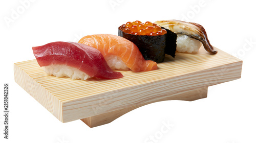 Foto Assorted sushi nigiri with tuna salmon roe, and eel on wooden board