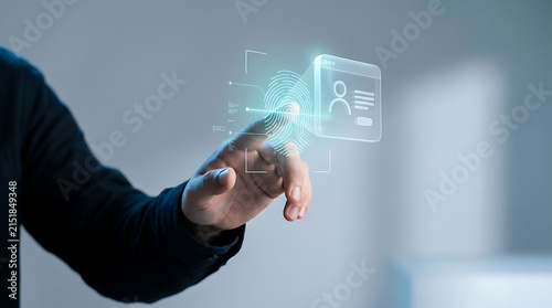 Fototapeta Person using futuristic digital interface for biometric identification and personal data access