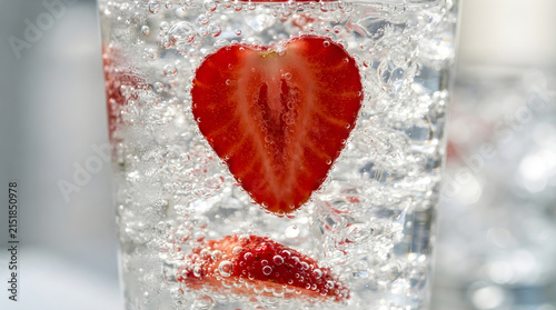 Freshness Concept Strawberry Slice in Carbonated Water Isolated on a transparent background