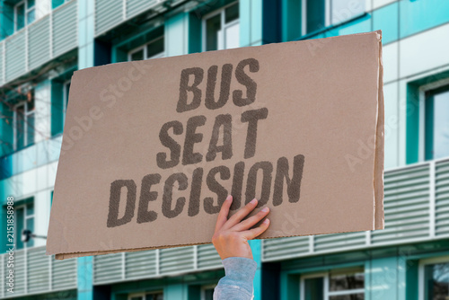Fotografie "Bus seat decision" Choosing a spot involves distance, noise, and social cues