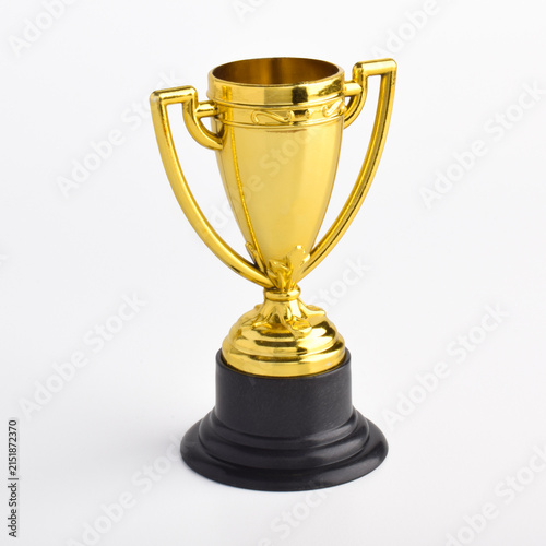 Konstfotografi Golden Trophy Cup with Black Base Isolated on White Background