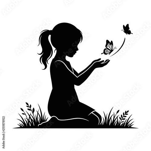 Silhouette of a girl sitting on grass with butterflies flying around her