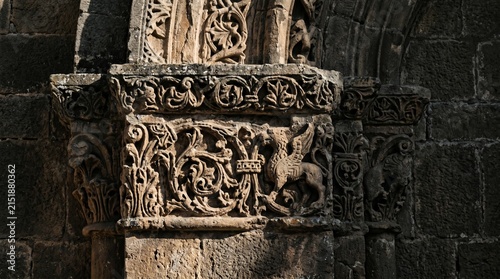 Ornate Stone Column with Intricate Gothic Carvings.