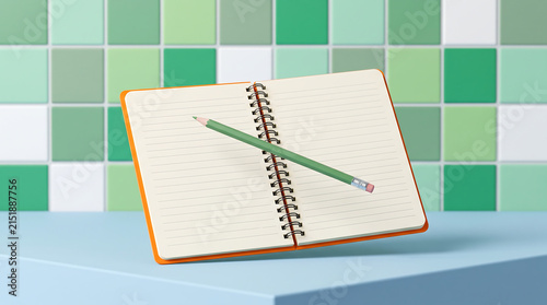 Open spiral notebook with a single pencil resting across the pages against a vibrant green tiled wall and blue surface