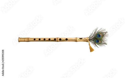Traditional indian bamboo flute with peacock feather isolated on transparent background