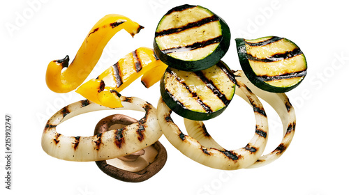 Grilled yellow bell pepper rings zucchini slices, and onion rings