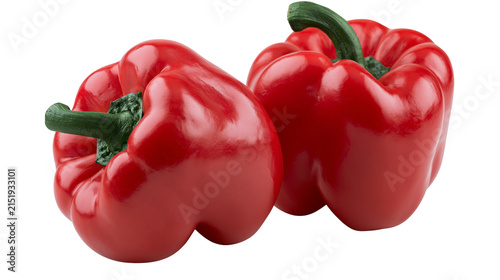 Two ripe red bell peppers with green stems