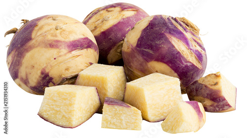 Bild auf Leinwand Whole and cubed rutabaga root vegetables with purple skin and yellow flesh