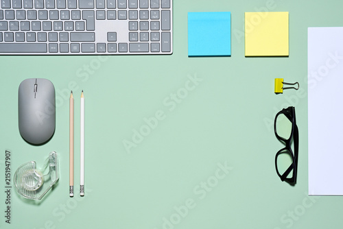 Office items on green background