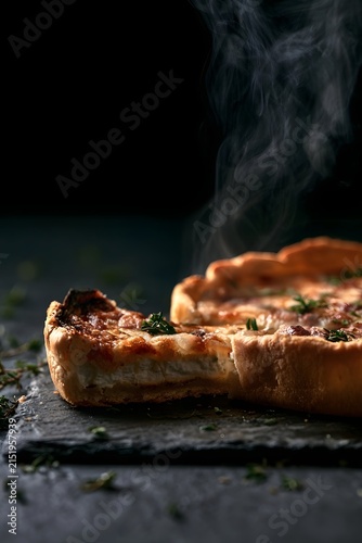 Goat Cheese Tart with Dramatic Steam and Thyme on Black Slate