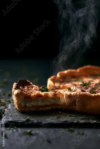 Fototapeta samoprzylepna Goat Cheese Tart with Dramatic Steam and Thyme on Black Slate