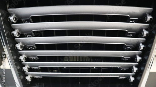 Obraz na plátně Close-up front view of an air cooler louver vent with horizontal adjustable slat
