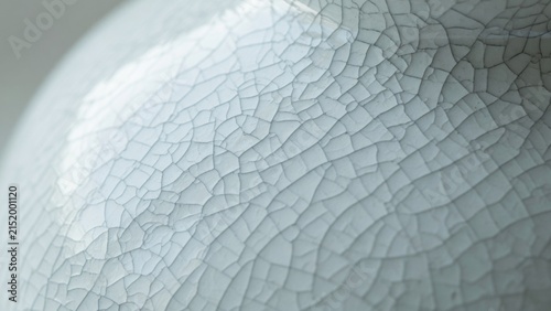cracked ceramic surface close-up view neutral detailed texture perspective textured backgrounds design elements white gray commercial natural light clean copy space editorial educational.