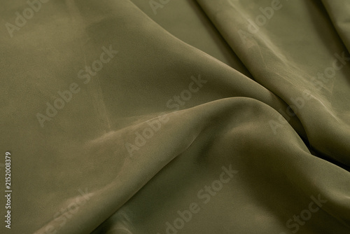 Elegant Soft Draped Olive Green Silk Fabric Texture Background