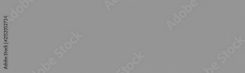 Gray finely textured cement plaster surface wide large background. Grey rough wall texture widescreen wallpaper. Abstract panoramic long backdrop