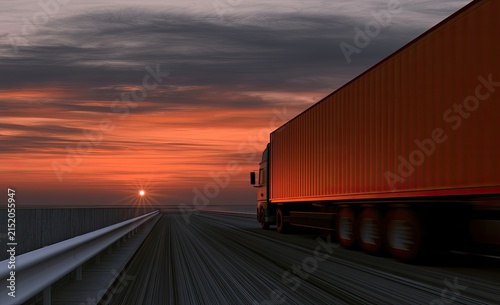 Truck speeds down highway at sunset, sun low on horizon