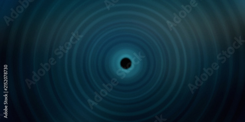 Abstract circular motion blur dark blue background with central focal point tunnel effect.