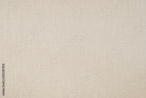 Beige fine woven canvas texture as background	