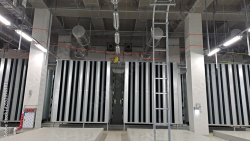 Generator room interior before generator installation with ventilation ducts and equipment infrastructure