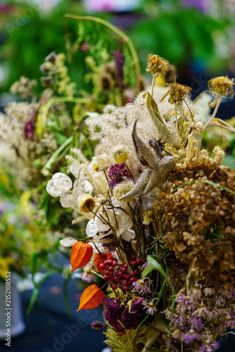 Bright display of dried flowers at a local market during the day