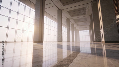 Wide angle view of spacious modern corporate lobby with marble columns and floor reflections.