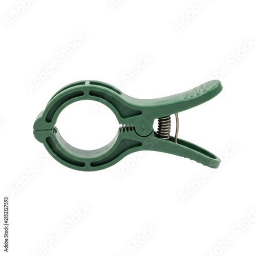 Bild auf Leinwand Green plastic spring clamp for gardening and household use