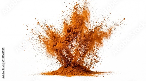 Vibrant brown cinnamon powder exploding into the air captured in motion on white background