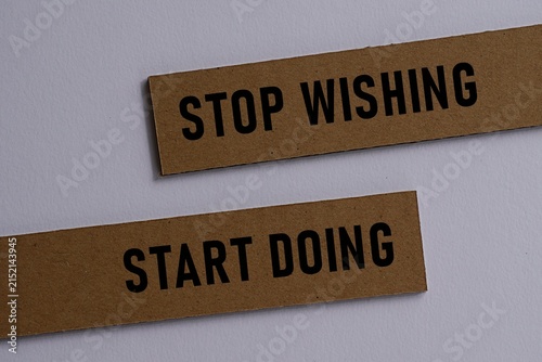 STOP WISHING START DOING. Motivational quote. Self-inspiration shapes personality. Learning concept. Self-development. Encouraging words. Life-changing guide