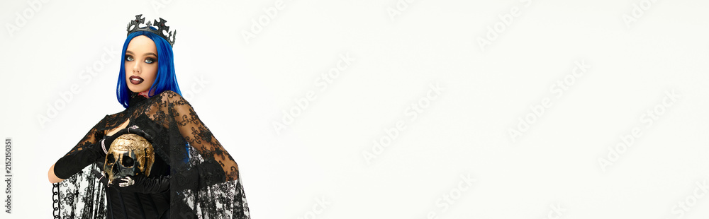 Fototapeta premium Dark queen enchantress with blue hair for a haunting Halloween look