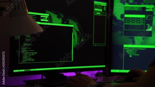 Programmer analyzing green terminal screens, focused security review with lamp glow, code windows and command output visible, developer taking notes in notebook while scanning logs