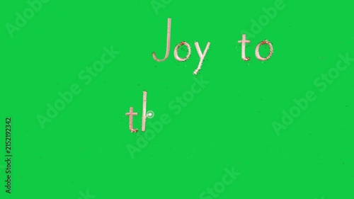 Initial pink spark bursting and drawing Joy to World revealing title on transparent background