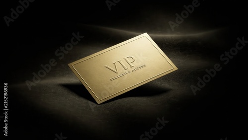 A luxurious gold vip exclusive access card resting on a dark textured surface