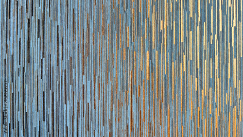 Abstract luxury gold and blue metallic vertical stripe wallpaper texture background with glittering bronze line details for modern interior design, metallic card backdrop, and stylish web decor.