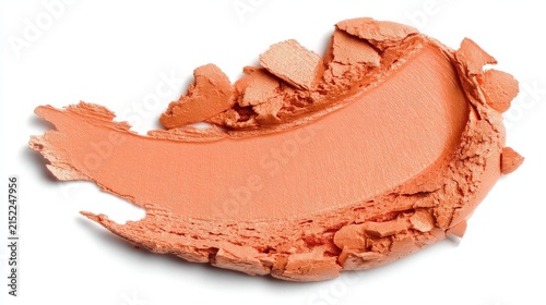 Peach-colored powdered cosmetic makeup product with smooth and broken texture