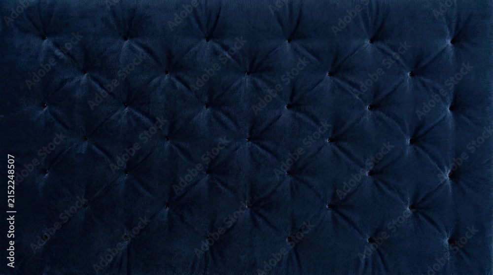 Naklejka premium Luxury Dark Blue Velvet Upholstery Texture with Tufted Buttons