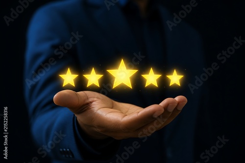 Business person offering glowing five star rating in dark professional setting
