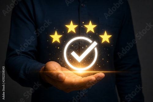 Business professional holding glowing five-star rating and checkmark symbol over hands