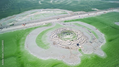 Aerial View of Bishui Yaotai Formation in Qarhan Salt Lake: Emerald Green Water, Sunset Glow and White Salt Crust in Qinghai