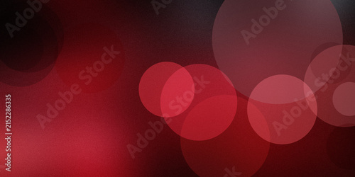 Red bokeh lights abstract background with soft focus and grainy texture.