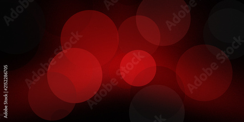 Red circular bokeh lights overlay on black background for festive holiday atmosphere.