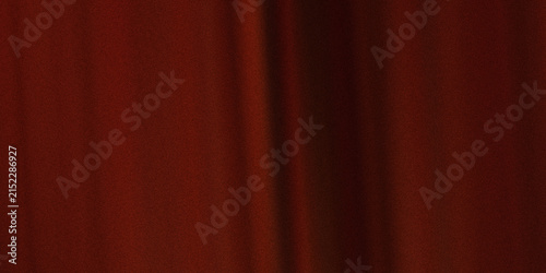 Rich red fabric texture with soft folds and subtle grain ideal for elegant backdrops.