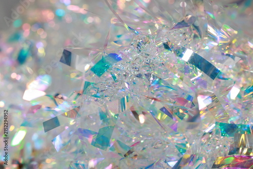 Cuadro en lienzo Shimmering  holographic tinsel reflect colors under bright light
