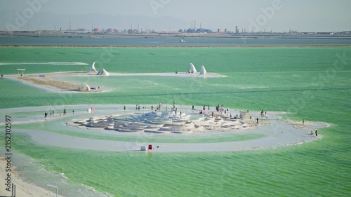 Aerial View of Bishui Yaotai Formation in Qarhan Salt Lake: Emerald Green Water, Sunset Glow and White Salt Crust in Qinghai