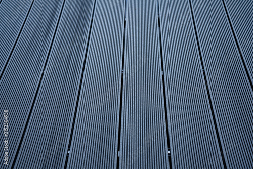 Grey wpc floor close up shot for industrial background.