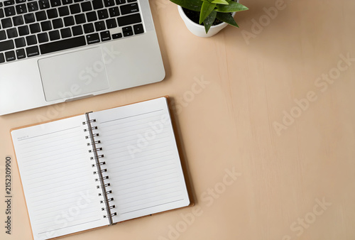 Overhead view of a laptop, ...