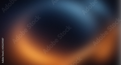 Bild auf Leinwand Abstract dark luxury background with glowing warm gold and amber light halo on d