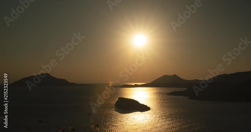 Timelapse of the sun setting over the Aegean Sea in Athens, Greece