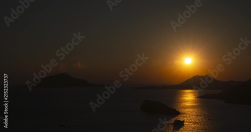 Sun setting over the Aegean Sea in Athens, Greece