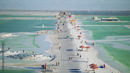 Aerial View of Ten-Thousand-Zhang Salt Bridge in Qarhan Salt Lake: Pure Emerald Water, White Salt Causeway and Sunlight in Qinghai