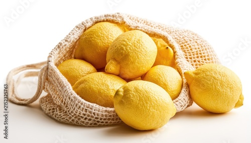 Fresh Lemons Overflowing from a Reusable Mesh Bag.